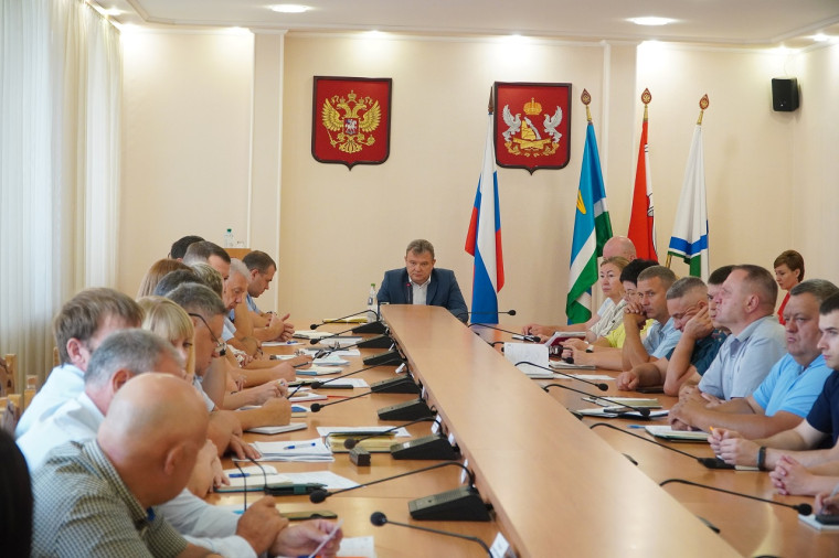 В администрации района. В администрации района.