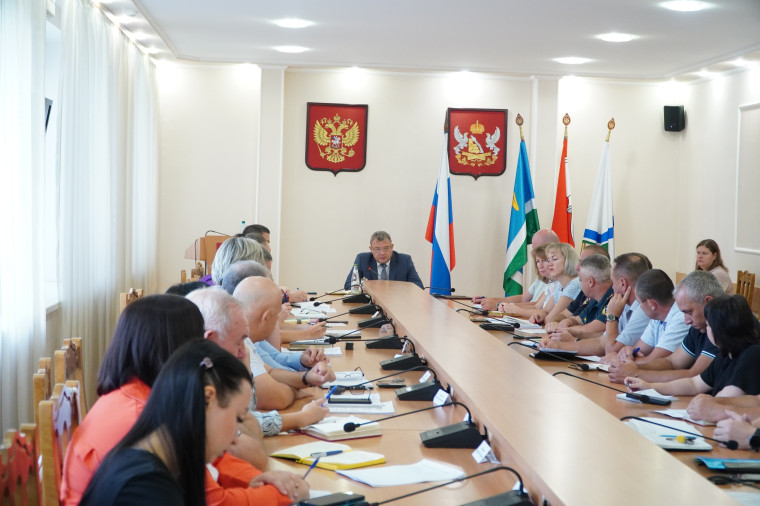 В администрации района. В администрации района.