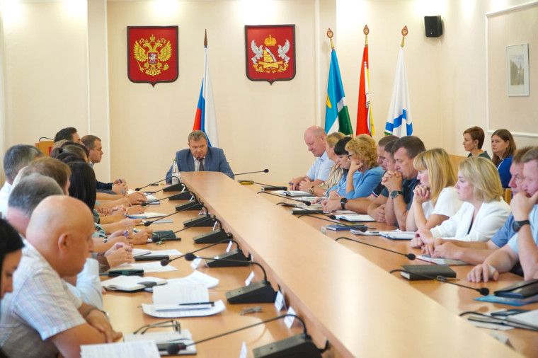 В администрации района. В администрации района.
