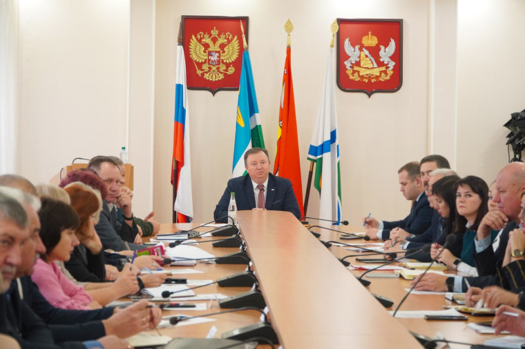 В администрации района. В администрации района.