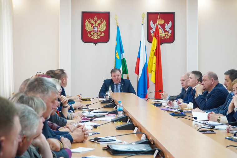 В администрации района. В администрации района.